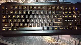 Sades keyboard and mouse set in light orange led.
