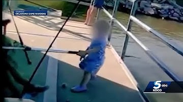 New video shows tense moments when game warden rescues toddler from Oklahoma lake