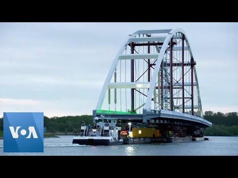 Massive Bridge Moved Through Netherlands River