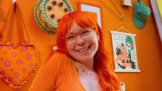 Woman obsessed with orange - wears shades of it every day, has orange hair and flat | SWNS