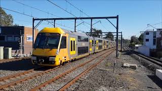 Peak hour trains at speed in Concord West - 2/10/2018