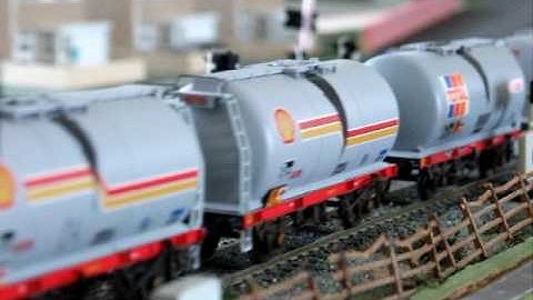 Class 37 EWS passes with a Tanker train going south as a EWS Class 66 heads north