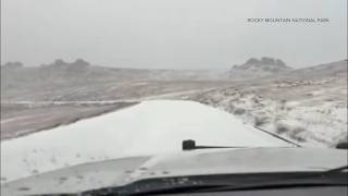 Full Snow falling in Colorado mountains, winter weather closes Trail Ridge Road Update