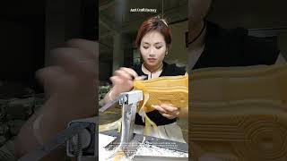 Shoe Sole Trimming : A soft rubber sole is shaped against a fixed blade