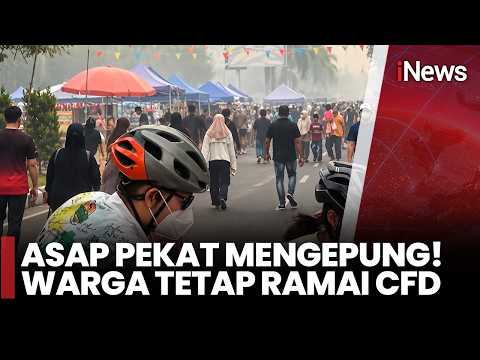 BAHAYA MENGINTAI! Warga Berolahraga di Tengah Kabut Asap Karhutla