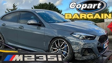 WE BOUGHT A CRASH DAMAGED BMW M235i FROM COPART SALVAGE AUCTION