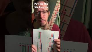 16. Putting stickers on  learningguitar