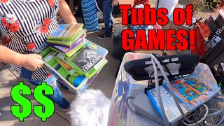 She brought out video games THREE TIMES at this YARD SALE!
