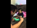 Baby girl cry every time while her father cuts her nail