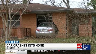 One injured after car crashes into home in Huntsville