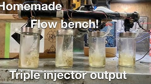 Flow testing decapped injectors with a homemade flow bench.