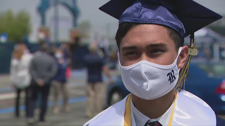 Reavis High School holds social distancing graduat...