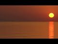 لحظة شروق الشمس على البحر فيديو للتصميم بدون حقوق