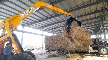 G-Rafo Loading Machine with orange peel grab attachment