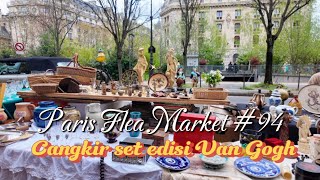 Pasar loak di bawah kolong jembatan Paris ~ ada cangkir set edisi Van Gogh