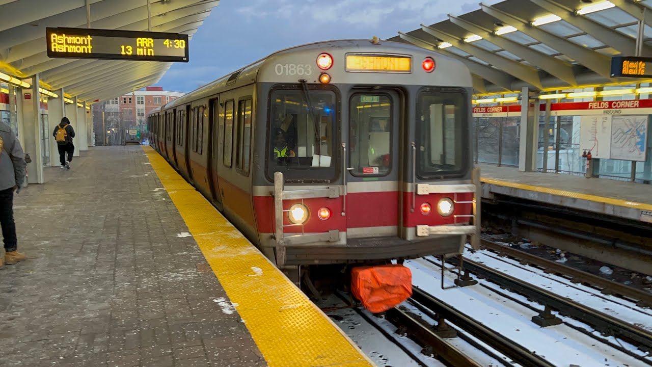 An Ashmont Bound Series #3 Bombardier Cars On The Red Line Makes a Stop And Departs Fields Corner