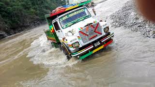 tipper cross a sunkoshi river in nepal