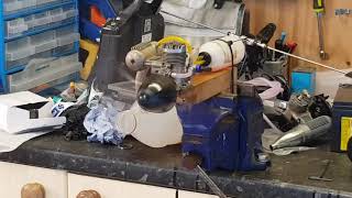 Bench running an OS Max 40 FP with remote needle valve