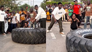 Watch how Small Pin lifted this heavy and big tire,you won’t he lifted it kwaw weezy best coach😂😂😂