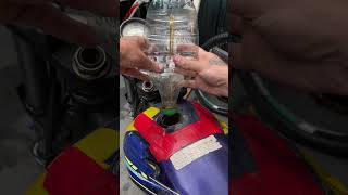 The homemade tool he built to pump fuel.A practical fix with #USA #FuelPumpHack #DIYFunction