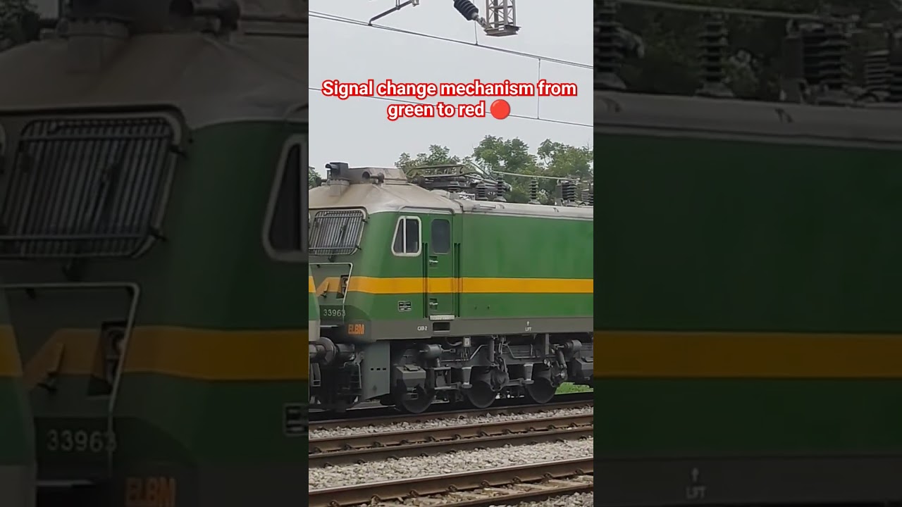 signal change mechanism from green to red of powerful locomotive that carries goods 