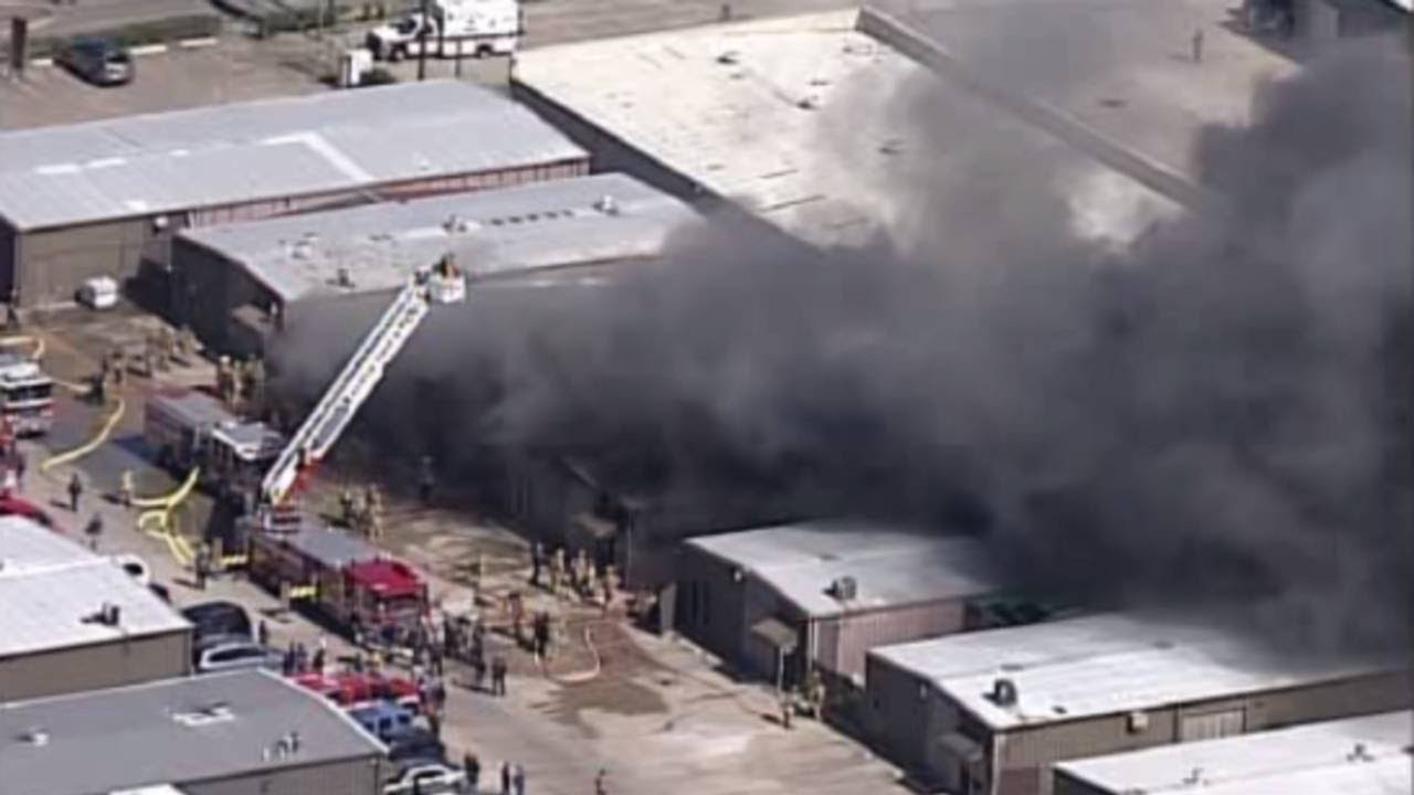 Firefighters battle warehouse fire in southwest Houston - YouTube