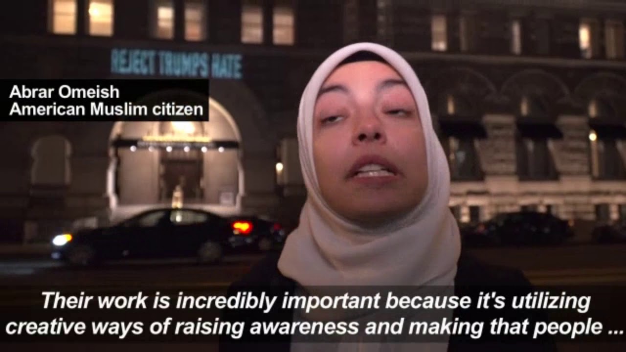 The artist behind the 'light projection protests' on Trump Hotel - YouTube