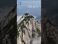 Sea of clouds rolls over Mount Huashan, China