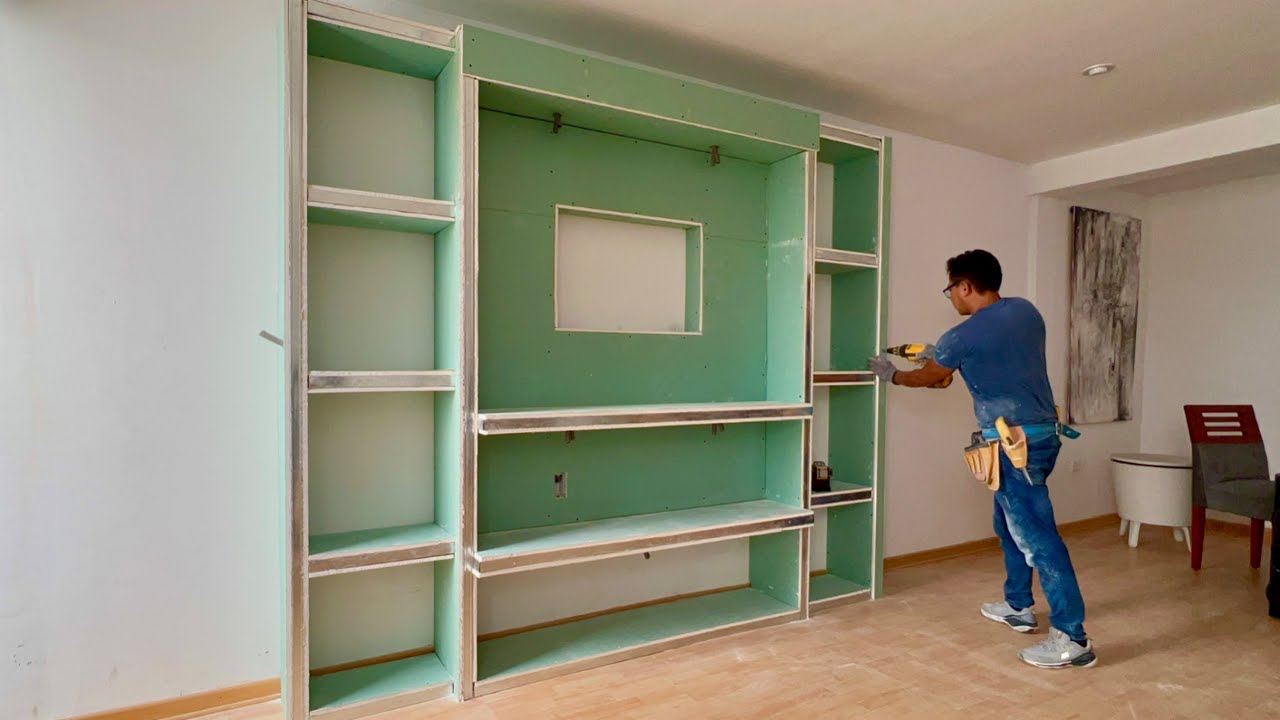 Green Design - Aquí no paramos. Pared falsa para puerta corrediza con  mueble para tv y tablillas entregada hoy mismo.