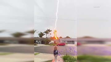 Caught on Camera: Lightning Strikes Tree Behind Kids in Huntington Beach