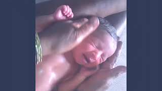 Newborn baby's Indian style oil massage