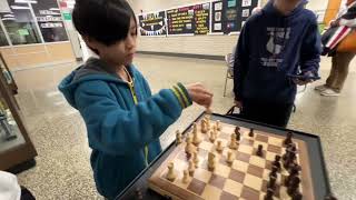 Kids play chess, Daniel on his first tournament