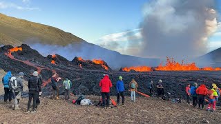 People watch as lava spews out of volcanic fissure in Iceland | AFP