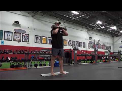 Heels Elevated Kettlebell Front Squat - YouTube