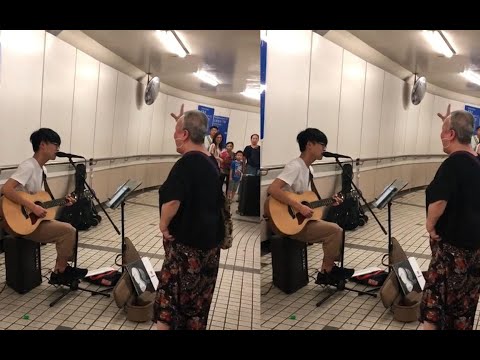 男孩街头演唱《海阔天空》走红，网友沸腾了：被天使吻过的嗓子！