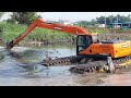 Long arm DOOSAN Excavator digging mud to take out from Canal