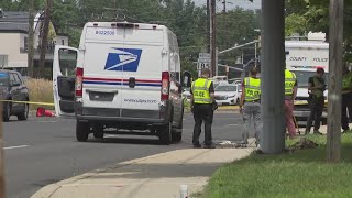 Police investigate deadly crash involving mail truck