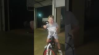6 year old boy standing up on his bike while riding