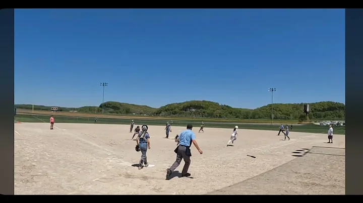 3rd base ashlyn peters covers a bunt and throws to...