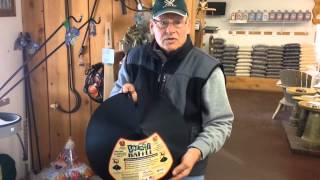 Lawrence Jones, CEO of Cedar Craft WIld Bird Center, shows some of the anti-squirrel merchandise that he sells at his store.