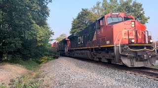 CN Intermodal train with lead CN engine 2278 with CN engine 2246 trailing in Fenton Michigan