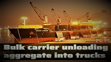 BIG SHIPS | Unloading of aggregate onto trucks by a bulk carrier
