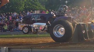The Twister alcohol pulling tractor. Flames.