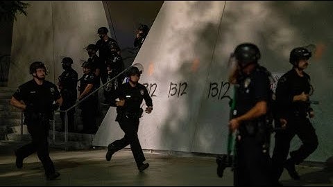 Two police officers shot during anti-racism protests in Louisville