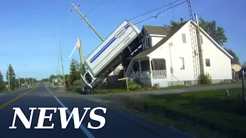 Truck collides with hydro pole, lands on house roof in Alban