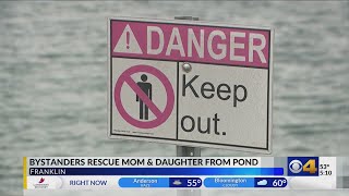 Bystanders rescue mother, child after truck crashes into pond in Franklin