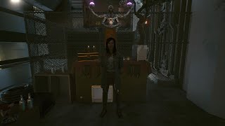 Cyberpunk 2077 showcasing a habited area with statue in Corpo Plaza, City Center