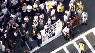 Activists protesting companies working with ICE arrested at Amazon in Cambridge