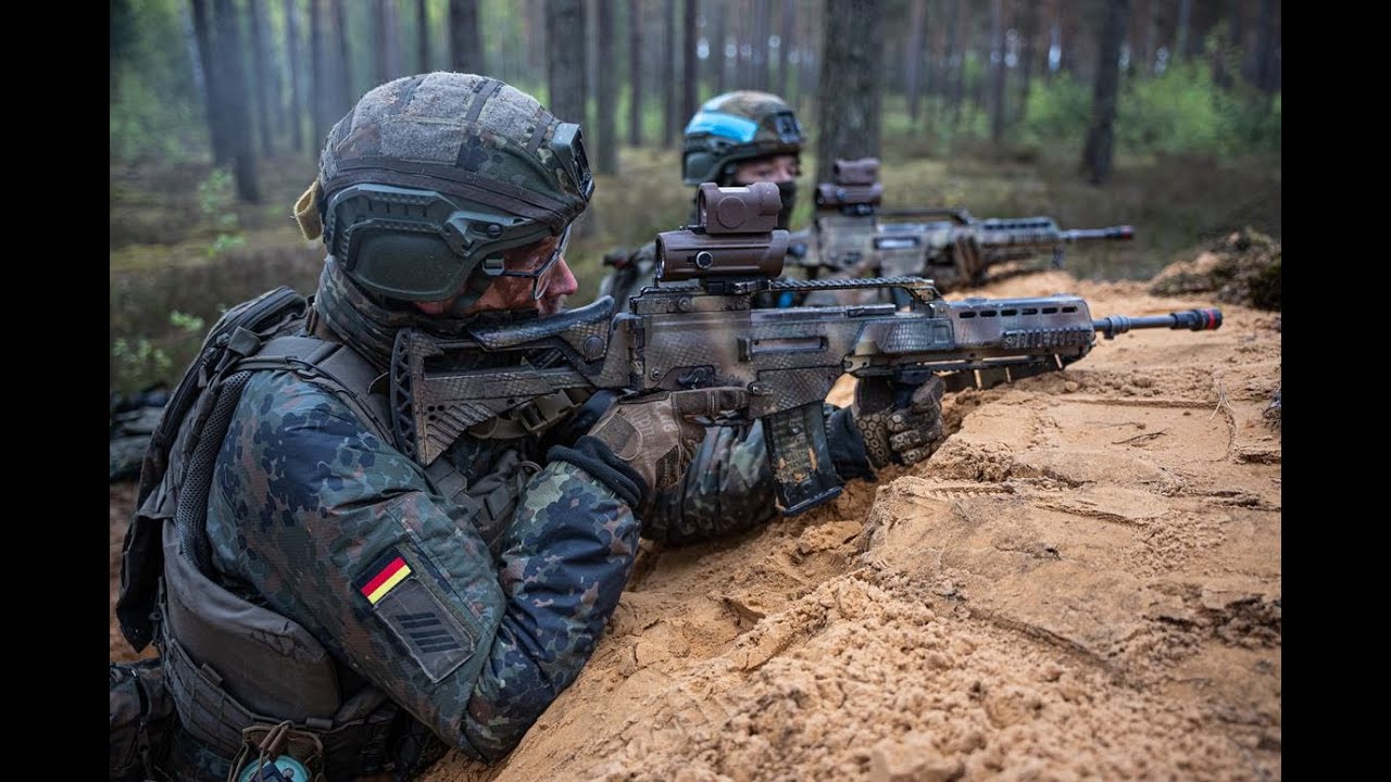 NATO forces sharpen skills in Lithuania during Iron Wolf 2025 - YouTube