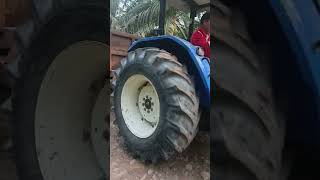 Tractors Commonly Used To Transport Fertilizer And Palm Fruit on Oil Palm Plantations tractor